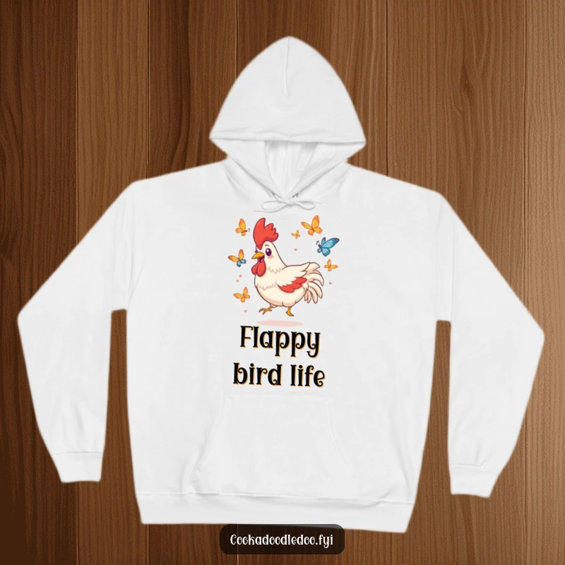 Funny hoodie featuring a playful Kawaii rooster character with a happy grin, joyfully in pursuit of butterflies.