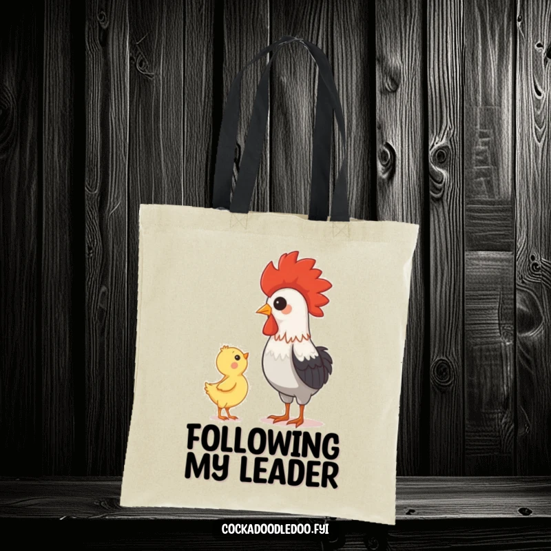 Funny depiction of a baby chick admiring a proud rooster on a durable tote bag, perfect for carrying daily needs.